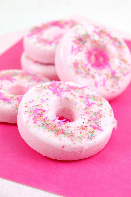 Pink Donut DIY Bath Bomb- Make this strawberry donut DIY bath bomb recipe to keep for yourself or give as gifts! They smell amazing and are easy to make! | #DIY #craft #bathBomb #diyGift #ACultivatedNest
