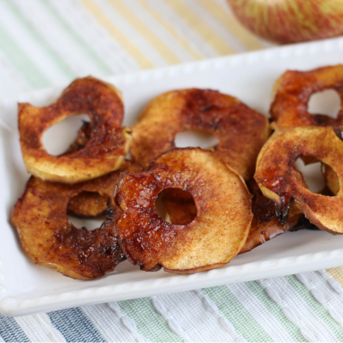 Air Fryer Apple Chips- Try these tasty homemade air fryer apple chips and you will have a new favorite snack. They are kid-friendly and super easy to make! | #airFryer #recipe #homemadeSnacks #appleChips #ACultivatedNest