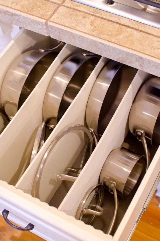 12 Space Saving Kitchen Drawer Organizing Ideas- If you want to be able to find things fast in your kitchen, you need to check out these space saving kitchen drawer organization ideas! | #organizingTips #homeOrganization #kitchenOrganization #organizing #ACultivatedNest