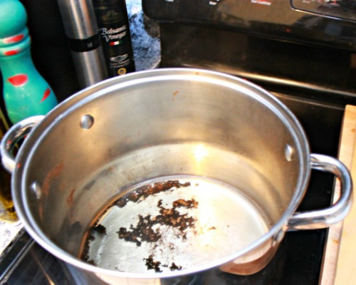 10 Best Cookware Cleaning Tips- Clean up charred food and burned on grease easily with these 10 cookware cleaning tips! These cookware cleaning hacks will leave your cookware looking brand new! | cleaning copper cookware, cleaning stainless steel cookware, cleaning cast iron pans, #cleaningHacks #cleaningTips #cleaning #kitchenCleaning #ACultivatedNest
