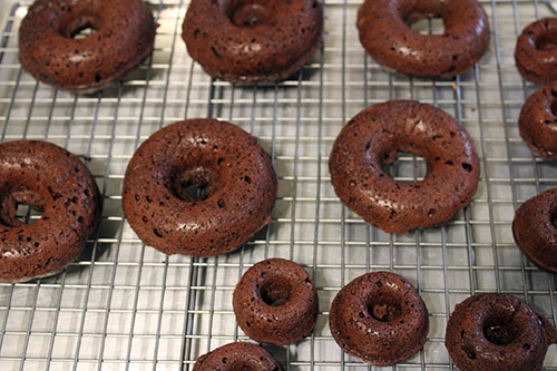 Homemade Baked Chocolate Donut Recipe- Not only are these delicious homemade chocolate baked donuts healthier because they aren't fried, but they're also really easy to make! Add some Halloween sprinkles for the perfect Halloween dessert! | #HalloweenRecipe #HalloweenDessert #donuts #baking #ACultivatedNest