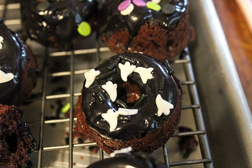 Homemade Buttermilk Chocolate Donut Recipe- Not only are these delicious homemade chocolate baked donuts healthier because they aren't fried, but they're also really easy to make! Add some Halloween sprinkles for the perfect Halloween dessert! | #HalloweenRecipe #HalloweenDessert #donuts #baking #ACultivatedNest
