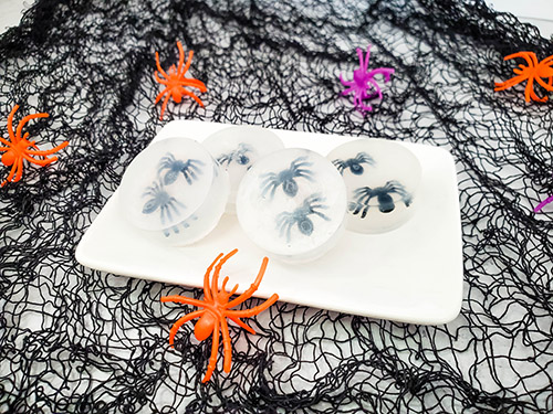 Spooky Spider Sack DIY Halloween Mini Soaps- This fun spider sack mini soaps craft makes the perfect DIY Halloween party favors! This is also a fun Halloween kids craft! | #HalloweenCraft #HalloweenDIY #kidsCrafts #diySoap #ACultivatedNest