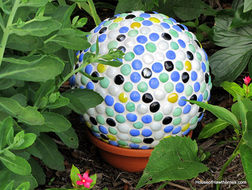 10 Beautiful DIY Garden Globes- Add a beautiful decorative touch to your garden or yard by making your own lovely DIY garden globes! They're so fun and easy to make! | #diy #gardenDIY #gardenGlobes #gazingGlobes #ACultivatedNest