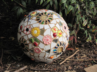 10 Beautiful DIY Gazing Globes- Add a beautiful decorative touch to your garden or yard by making your own lovely DIY garden globes! They're so fun and easy to make! | #diy #gardenDIY #gardenGlobes #gazingGlobes #ACultivatedNest