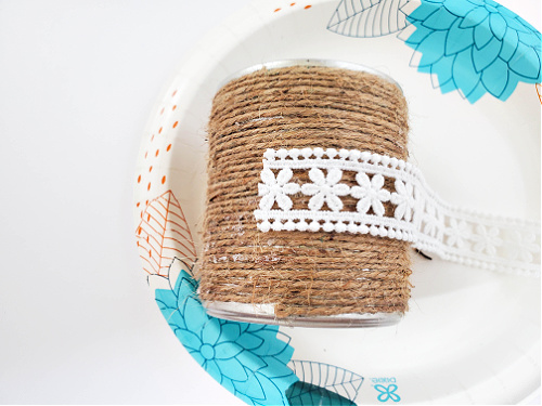 Twine and Lace Recycled Cans Craft- Don't throw out your tin cans! Instead, use them to make this cute twine and lace upcycled cans craft! This makes a great décor piece, or desk organizer! | #upcycle #craft #upcycling #diyProject #ACultivatedNest