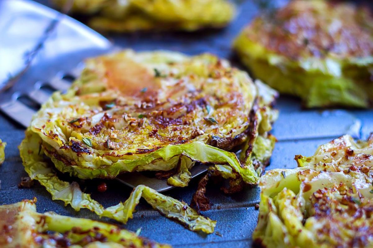10 Delicious Ways to Eat More Cabbage- Looking for healthy ways to use that head of cabbage in your fridge? From 20-minute turkey egg roll bowls to crispy roasted cabbage steaks and slow-cooker comfort food, these delicious recipes make it easy to add more nutrients to your diet! These budget-friendly, family-approved meals are perfect for quick weeknight dinners or simple side dishes. Click to find your new favorite way to cook cabbage! | #HealthyRecipes #CabbageRecipes #CleanEating #ACultivatedNest